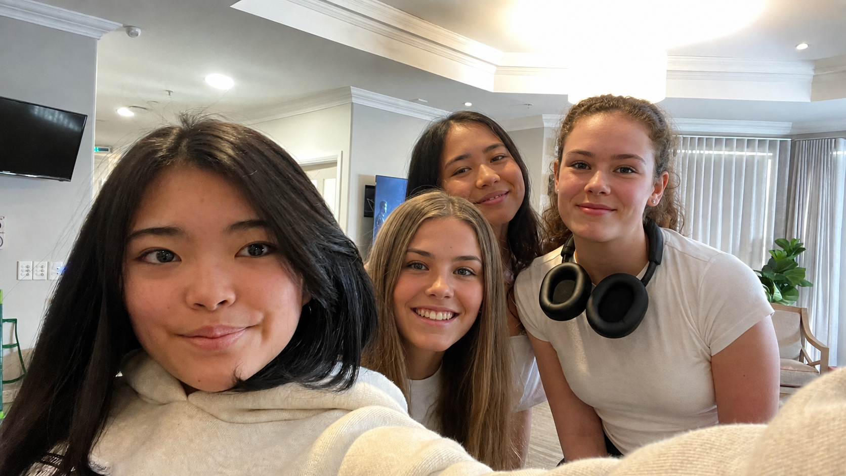 Student servicing team spending time with older people